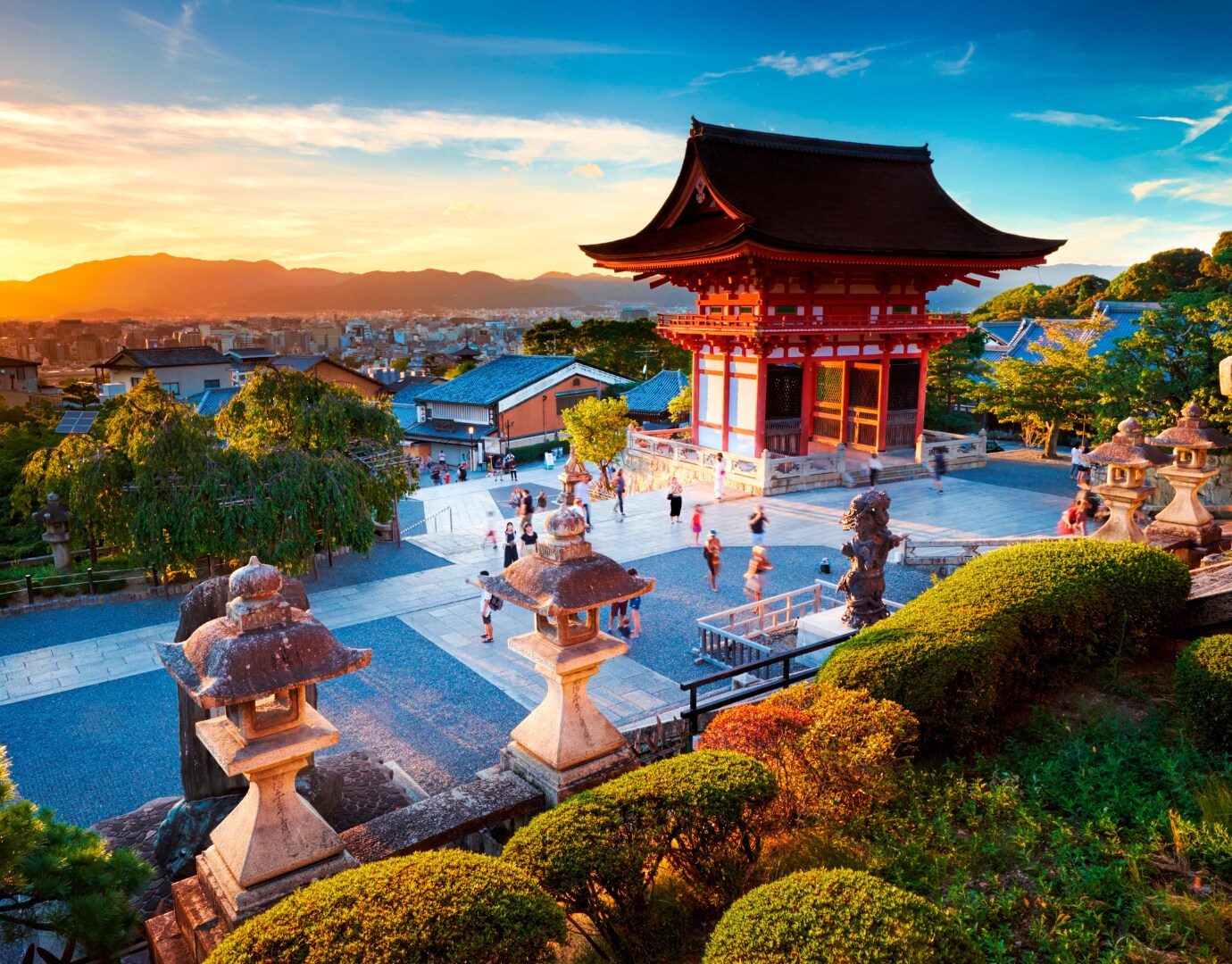 A vibrant sunset view of Kiyomizu-dera Temple with visitors exploring the scenic surroundings | MSC Cruises