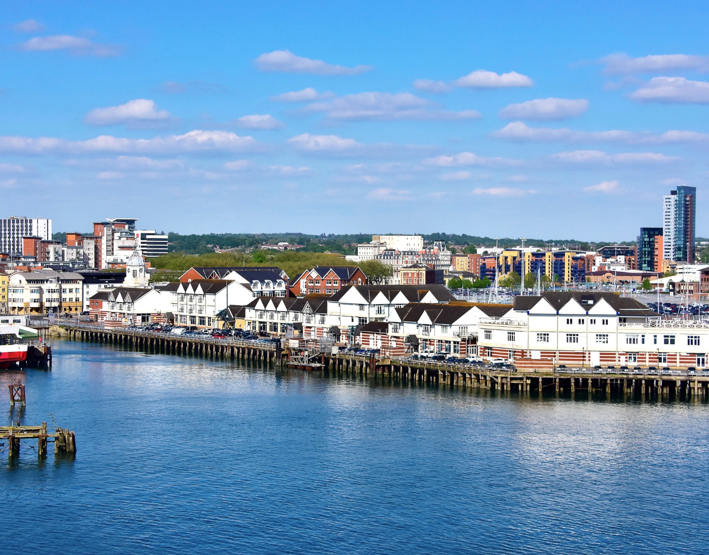 A vibrant waterfront with modern buildings and a marina, perfect for cruise travelers | MSC Cruises A vibrant waterfront with modern buildings and a marina, perfect for cruise travelers | MSC Cruises
