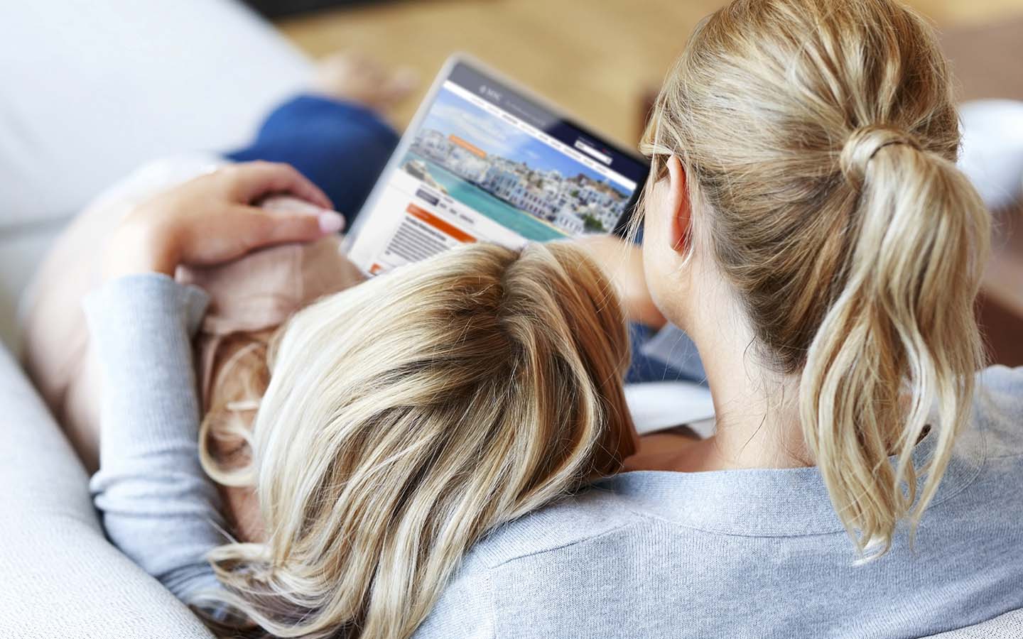 Two women browsing MSC Cruises destinations on a tablet | MSC Cruises