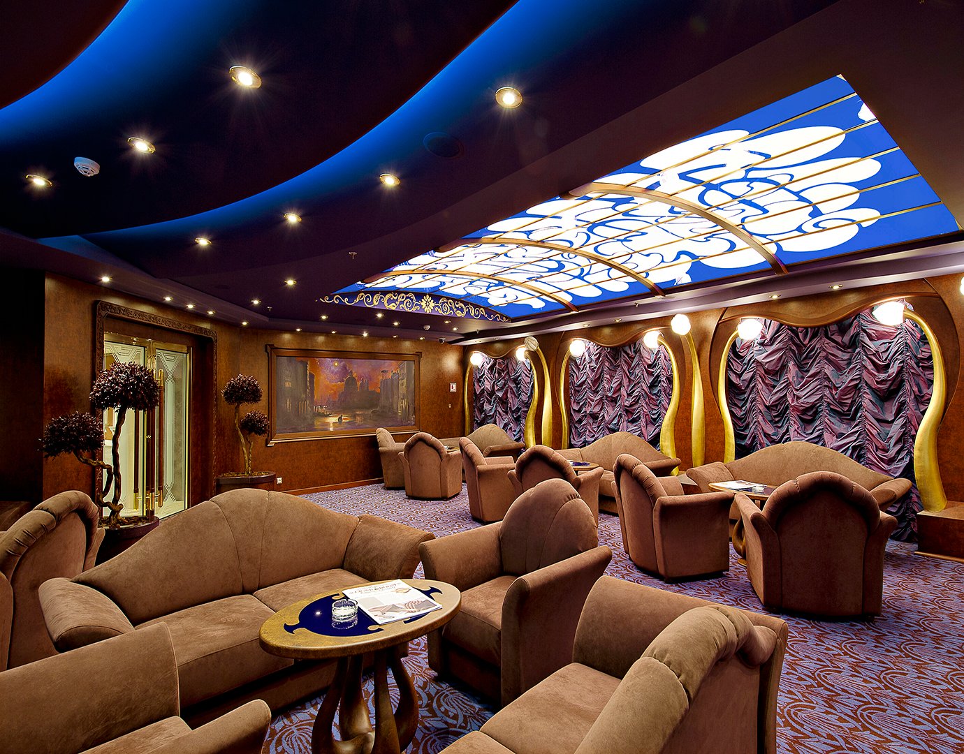 Elegant cruise ship lounge with plush seating and decorative ceiling | MSC Cruises Elegant cruise ship lounge with plush seating and decorative ceiling | MSC Cruises