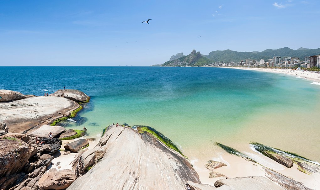 Scenic view of Ipanema Beach with turquoise waters and distant mountains in Rio de Janeiro | MSC Cruises